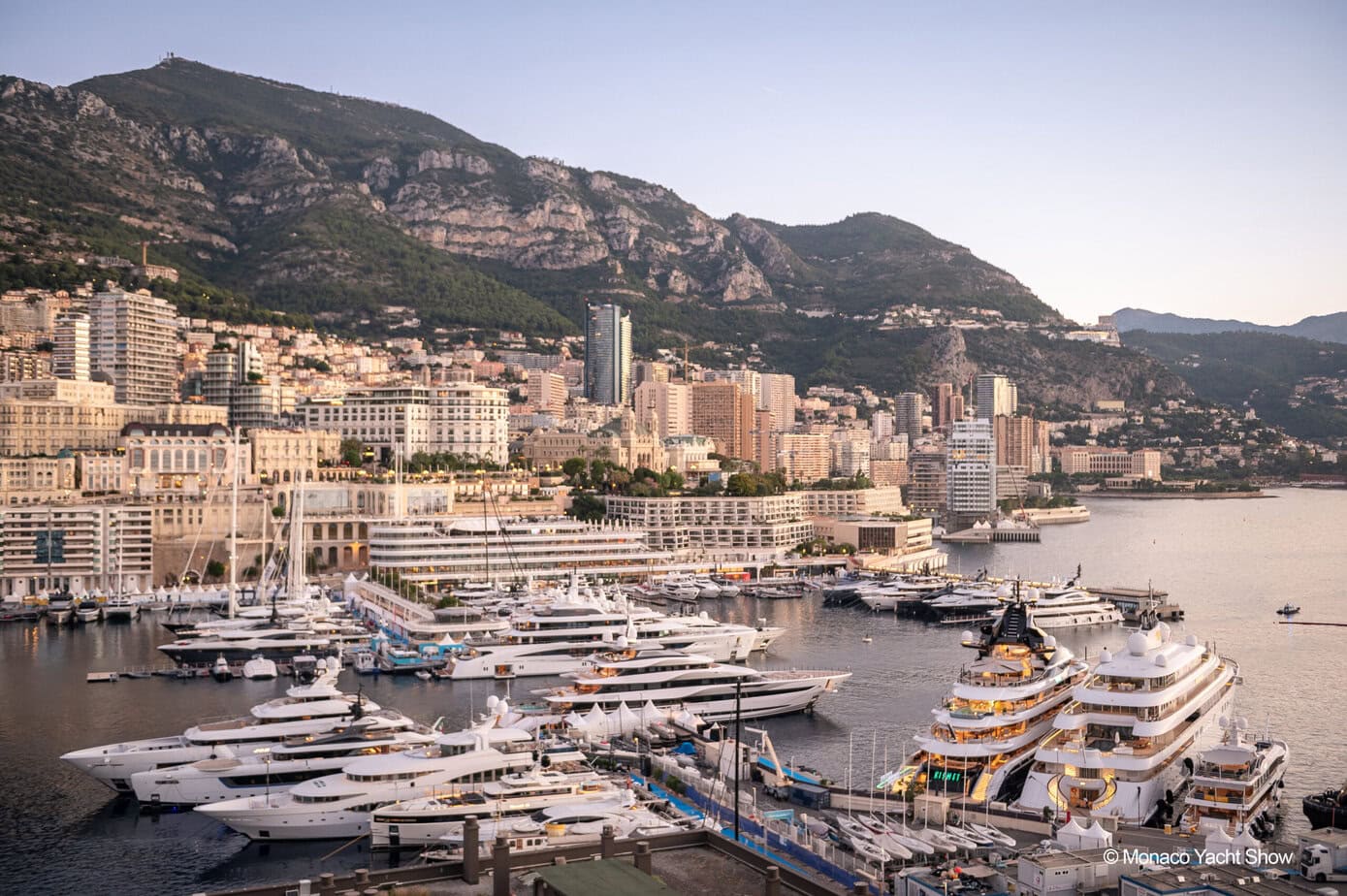 Port Hercule filled with superyachts beneath the Monaco hillside