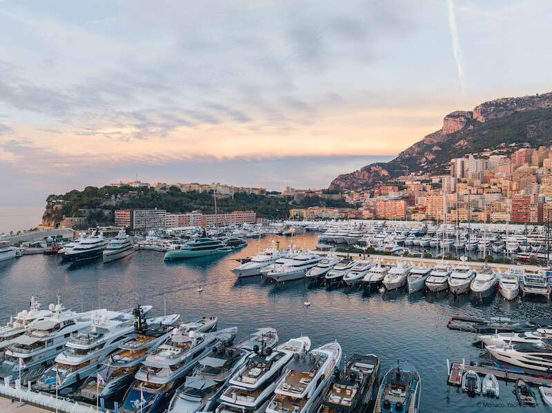 Aerial view of the Monaco Yacht Show harbour at dusk
